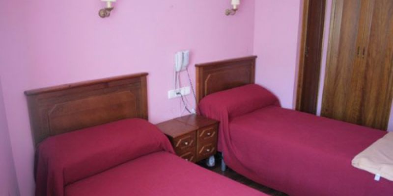 Camas en habitación compartida