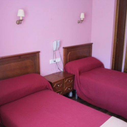 Camas en habitación compartida